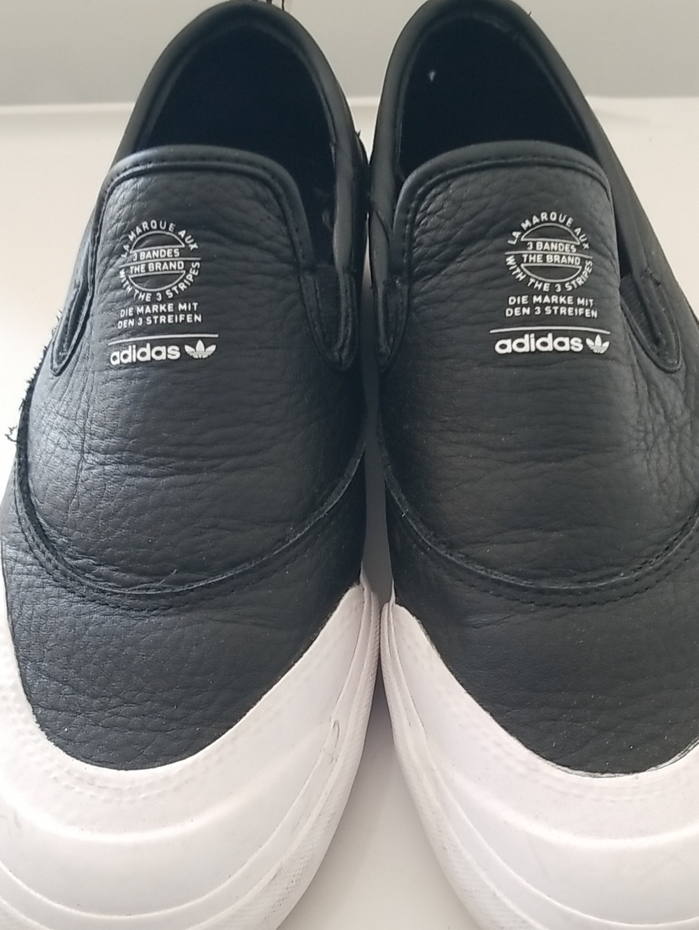 adidas Black Slip-On Loafers with White Sole